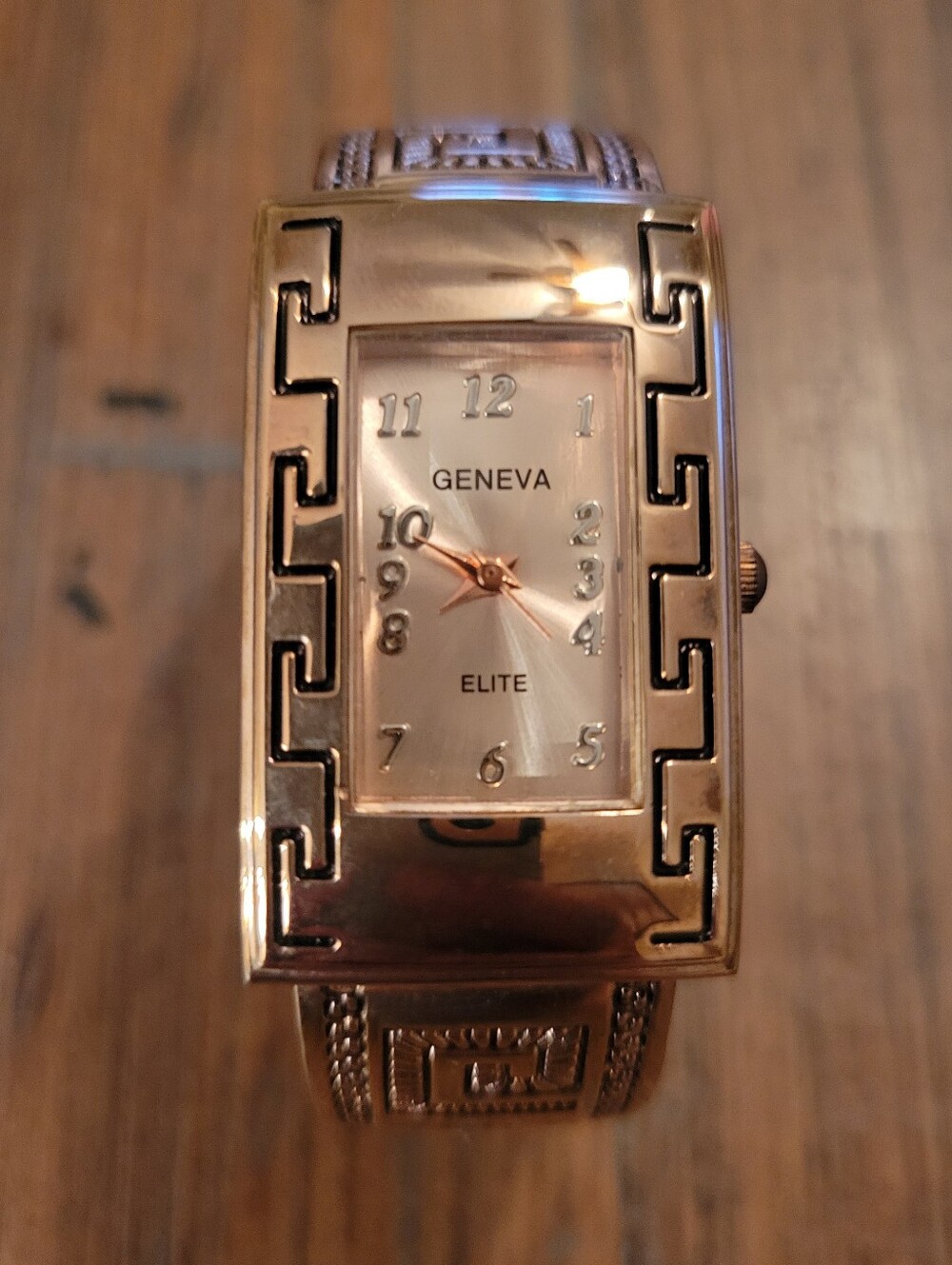 Geneva Elite women's rose gold-toned Greek key bangle cuff watch